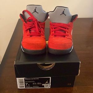 Red, black and white toddler Jordan 5 Retro.